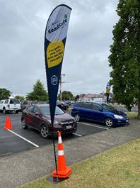 A car parked in a parking lot

Description automatically generated